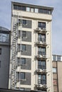 Emergency metal staircase at the back of the building with airconditioners. Royalty Free Stock Photo