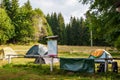 Emergency overnight campsite BuÃÂina Sumava, Bohemian Forest, BÃÂ¶hmerwald, Czech Republic. Several tents camping on grass in