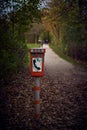 Emergency phone booth in a park Royalty Free Stock Photo