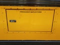 Emergency reflectors sign on door on yellow school bus