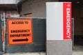 Emergency room entrance signs in a street outside of a hospital Royalty Free Stock Photo