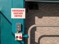 Emergency shut-off switch sign and button outside of pool Royalty Free Stock Photo