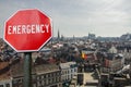 Emergency sign on Brussels city center background. Financial crash in world economy because of coronavirus. Global economic crisis Royalty Free Stock Photo