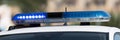 Emergency sirens on vehicles for urgent situation, closeup of blue lights on roof of police car