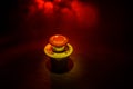 Emergency stop button, Disaster protection. Industrial concept. Red button on table in dark low key background Royalty Free Stock Photo