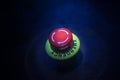 Emergency stop button, Disaster protection. Industrial concept. Red button on table in dark low key background Royalty Free Stock Photo