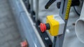 Emergency stop button on industrial machine with measuring scale Royalty Free Stock Photo