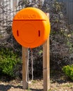 Emergency use, easy to find bright Orange Lifebuoy as deep water nearby