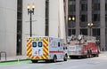 Emergency vehicles, fire engine and ambulance, on a Chicago street