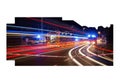 Emergency vehicles respond to scene with dramatic light trails at night Royalty Free Stock Photo