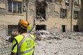 Fireman in earthquake rubble, Amatrice, Italy