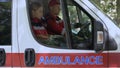 Emergency workers sitting in car, driving to emergency call-out, first aid