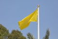 An emergency yellow flag warns in the beach in Spain Royalty Free Stock Photo