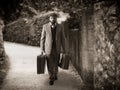 Emigrant with the suitcases Royalty Free Stock Photo