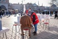 Eminonu, Istanbul, Turkey - 02.26.2021: blood donation volunteers signs checklist and Red Crescent Turk Kizilay employees help