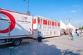 Operation field of Turkish Red Crescent TÃÂ¼rk Kizilay parked in square in a hot summer day with copy space and Turkish volunteers