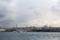 Eminonu and Suleymaniye mosque seen from Galata Bridge Galata Koprusu, on the European side, with ferry boats Vapor