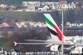 Emirates Airbus A380-861 jet deicing at the gate in Zurich in Switzerland Royalty Free Stock Photo