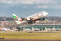 Emirates Airbus A380-861 jet leaving Zurich in Switzerland Royalty Free Stock Photo