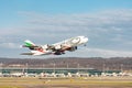 Emirates Airbus A380-861 jet leaving Zurich in Switzerland Royalty Free Stock Photo