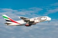 Emirates Airbus A380-861 jet leaving Zurich in Switzerland Royalty Free Stock Photo