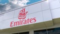 Emirates Airline logo on the modern building facade. Editorial 3D rendering