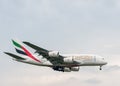 LONDON, ENGLAND - SEPTEMBER 27, 2017: Emirates Airlines Airbus A380 A6-EEJ landing in London Heathrow International Airport. Royalty Free Stock Photo