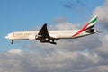 Emirates Airlines Boeing 777-300ER A6-ECM passenger plane landing at Frankfurt Airport