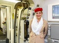 Emirates crew member meet passengers