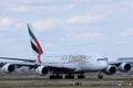 Emirates A380 plane doing taxi on runway