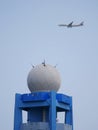 Emirates plane flying above meteorological radar in Curepipe, Mauritius