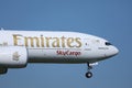 Emirates SkyCargo plane flying up in the sky Royalty Free Stock Photo