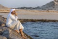 Emirati man on the beach Royalty Free Stock Photo