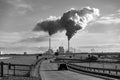 Emissions from industrial stacks in black and white Royalty Free Stock Photo