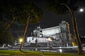 Emmanuel II monument and The Altare della Patria in a summer night near tree in Rome, Italy Royalty Free Stock Photo
