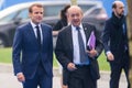 Emmanuel Macron, President of France and Jean-Yves Le Drian Minister for Europe and Foreign Affairs arrives to NATO SUMMIT 2018 Royalty Free Stock Photo