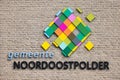 Logo at facade modern city hall Dutch village Emmeloord