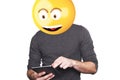 Emoji head man using digital tablet. Royalty Free Stock Photo