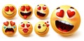 Emoji valentines vector set. Smiley emojis yellow face in heart eyes with different facial expression Royalty Free Stock Photo