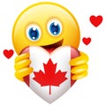 Emoticon holding heart symbol of Canada insignia Royalty Free Stock Photo