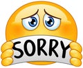 Emoticon with sorry sign Royalty Free Stock Photo