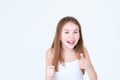 Emotion amazed astonished child thumbs up girl