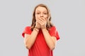 Shocked teenage girl covering her mouth by hands Royalty Free Stock Photo