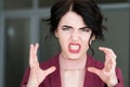 Emotion face rage fury strangle woman baring teeth Royalty Free Stock Photo