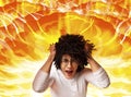 Emotional African American guy pulling his hair in anger and screaming on explosion background, collage Royalty Free Stock Photo