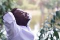 Emotional african  man laughing in wind Royalty Free Stock Photo