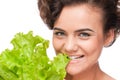 Emotional beauty woman with green lettuce