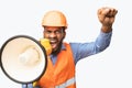 Emotional Black Construction Worker Shouting In Megaphone, Studio Shot