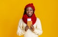 Emotional black girl in red hat holding ticket and passport Royalty Free Stock Photo