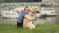 Emotional black and white portrait of a sad lonely girl hugging her dog Royalty Free Stock Photo